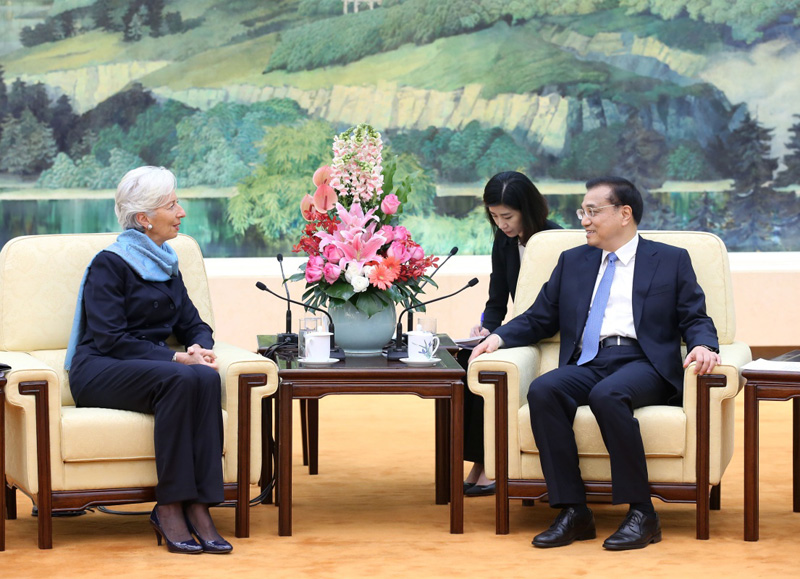 3月21日，國務院總理李克強在北京人民大會堂會見來華出席中國發(fā)展高層論壇2016年年會的國際貨幣基金組織總裁拉加德。